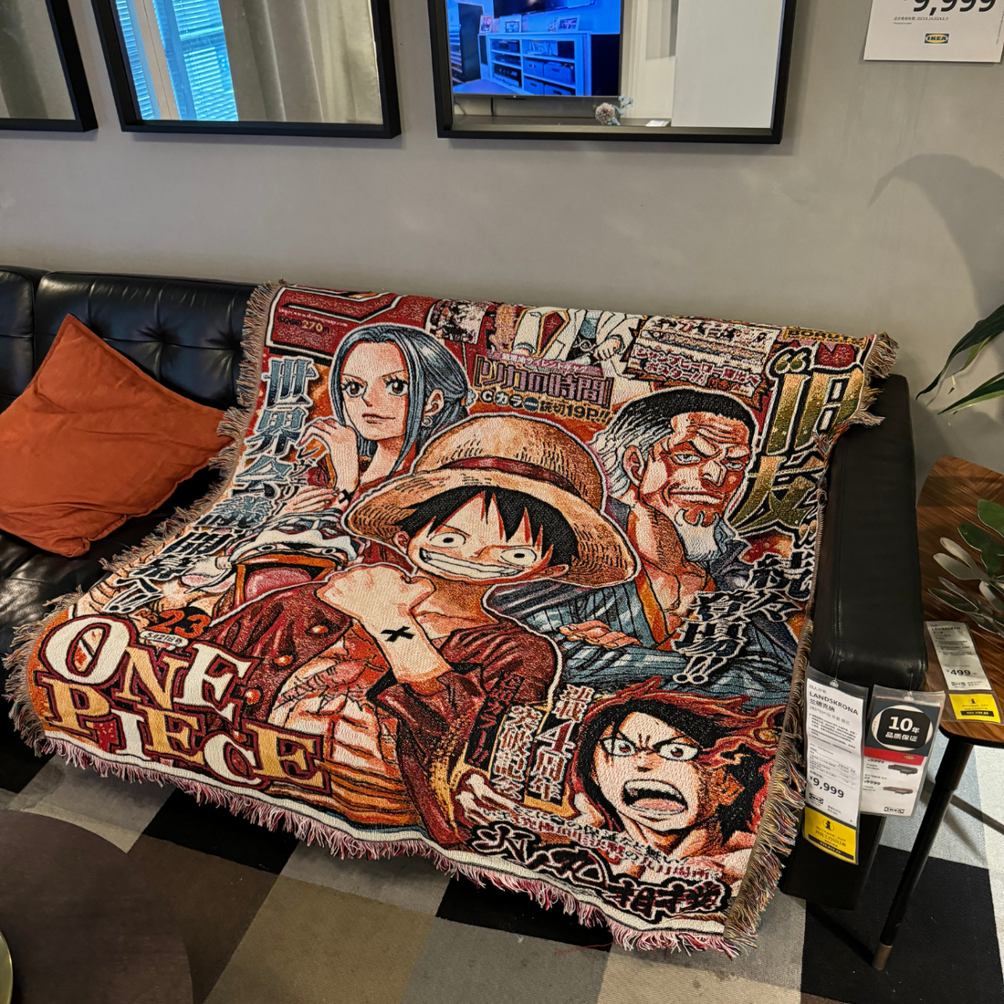 One Piece woven blanket featuring Luffy, Ace, Robin, and Garp in manga cover design from Weekly Shonen Jump, anime throw blanket