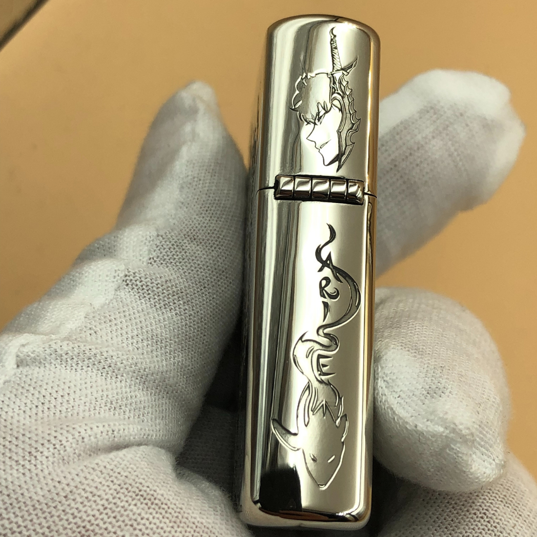 Left side of Zorro lighter engraved with Sung Jin-Woo profile, Carlie text, and a shadow beast from Solo Leveling anime