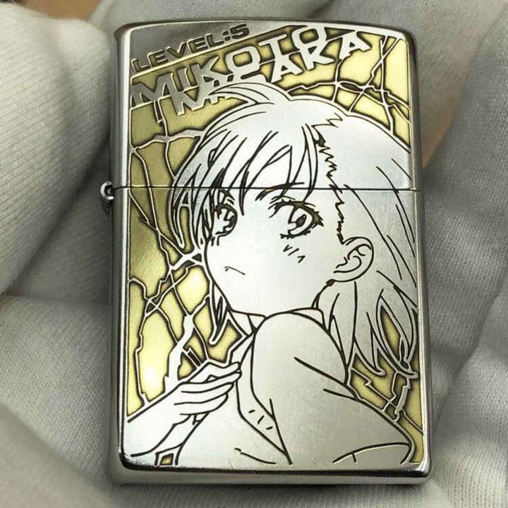Front view of a Zippo lighter engraved with Misaka Mikoto from "A Certain Scientific Railgun", featuring golden background details.