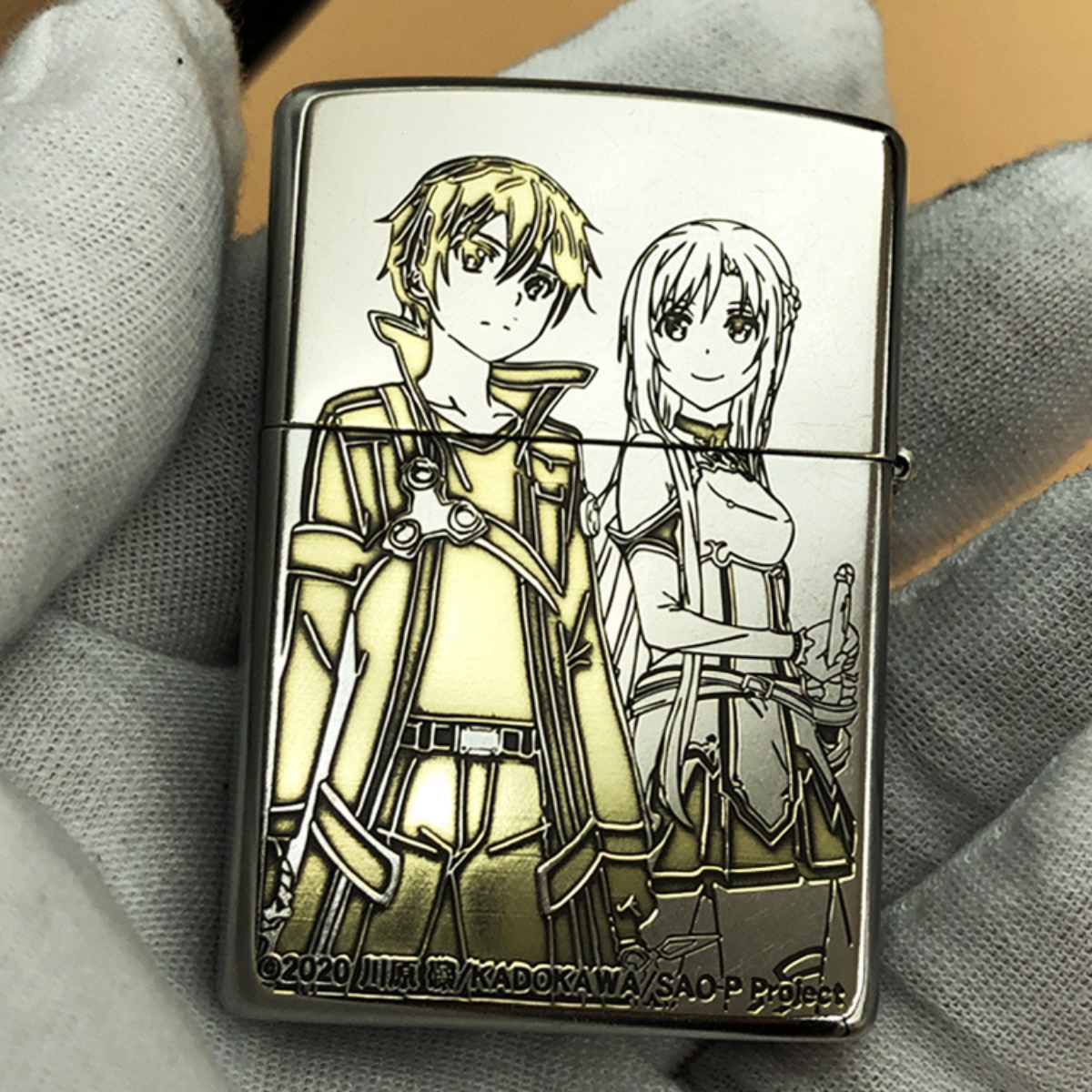 Front view of a Zippo lighter featuring an engraved design of Kirito and Asuna from Sword Art Online.